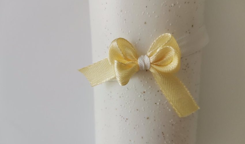 איך קושרים סרט פפיון לאריזת מתנה